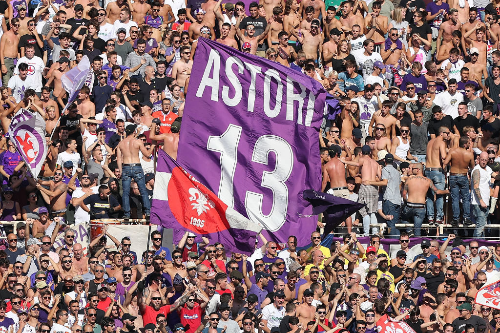 FLORENCE, ITALY - SEPTEMBER 30: Fans of ACF Fiorentina cheer for their team during the Serie A match between ACF Fiorentina and Atalanta BC at Stadio Artemio Franchi on September 30, 2018 in Florence, Italy.  (Photo by Gabriele Maltinti/Getty Images)