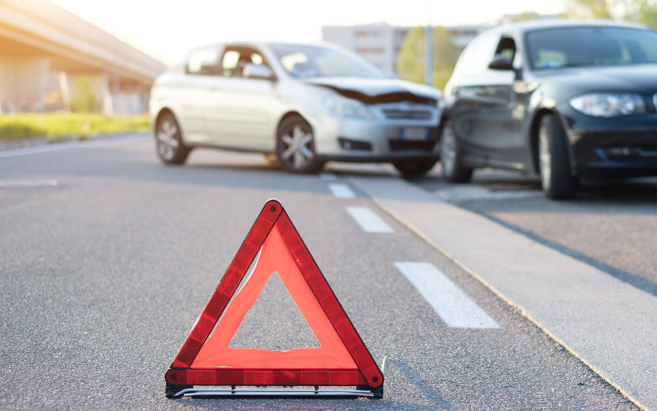 Reflective red triangle to point out a car crash