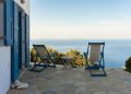 patio with a view, seaside in summertime. Folegandros, Cyclades, Greece